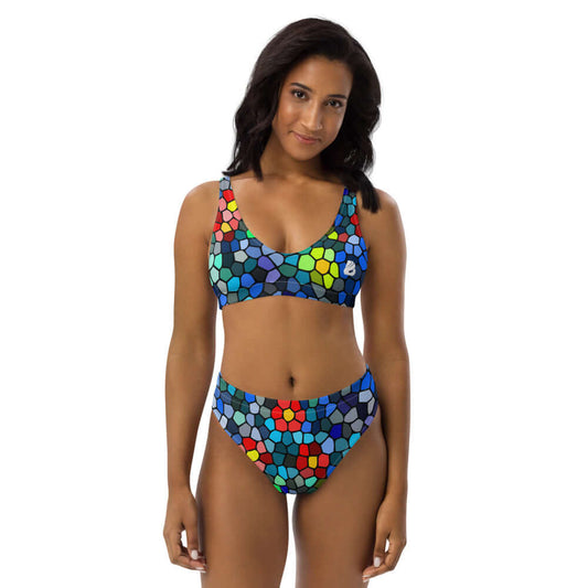 Colorful High Waist Bikini N°0 with mosaic pattern worn by a model, featuring eco-friendly recycled materials for ultimate comfort.