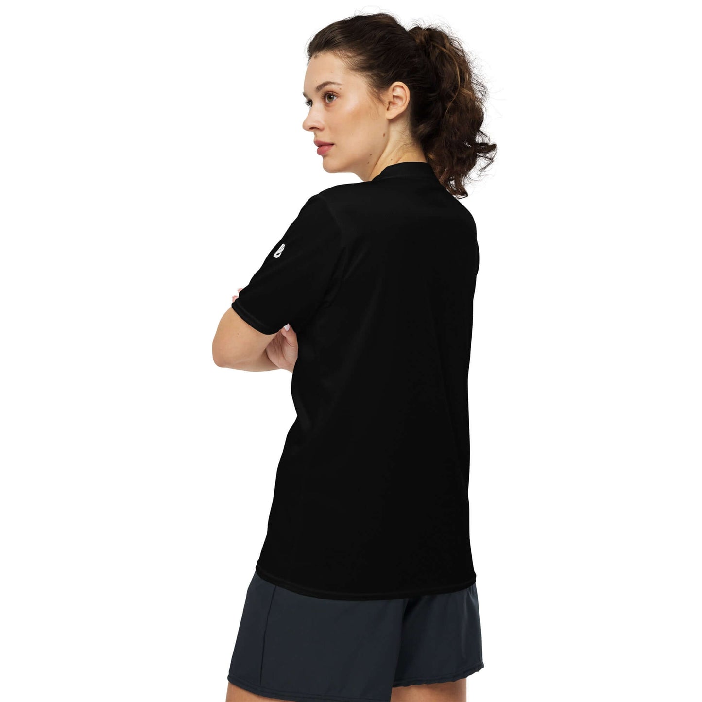 Person wearing Recyceltes Unisex-Trikot N°1 with breathable recycled polyester fabric, double-layered V-neck, and two-way stretch.