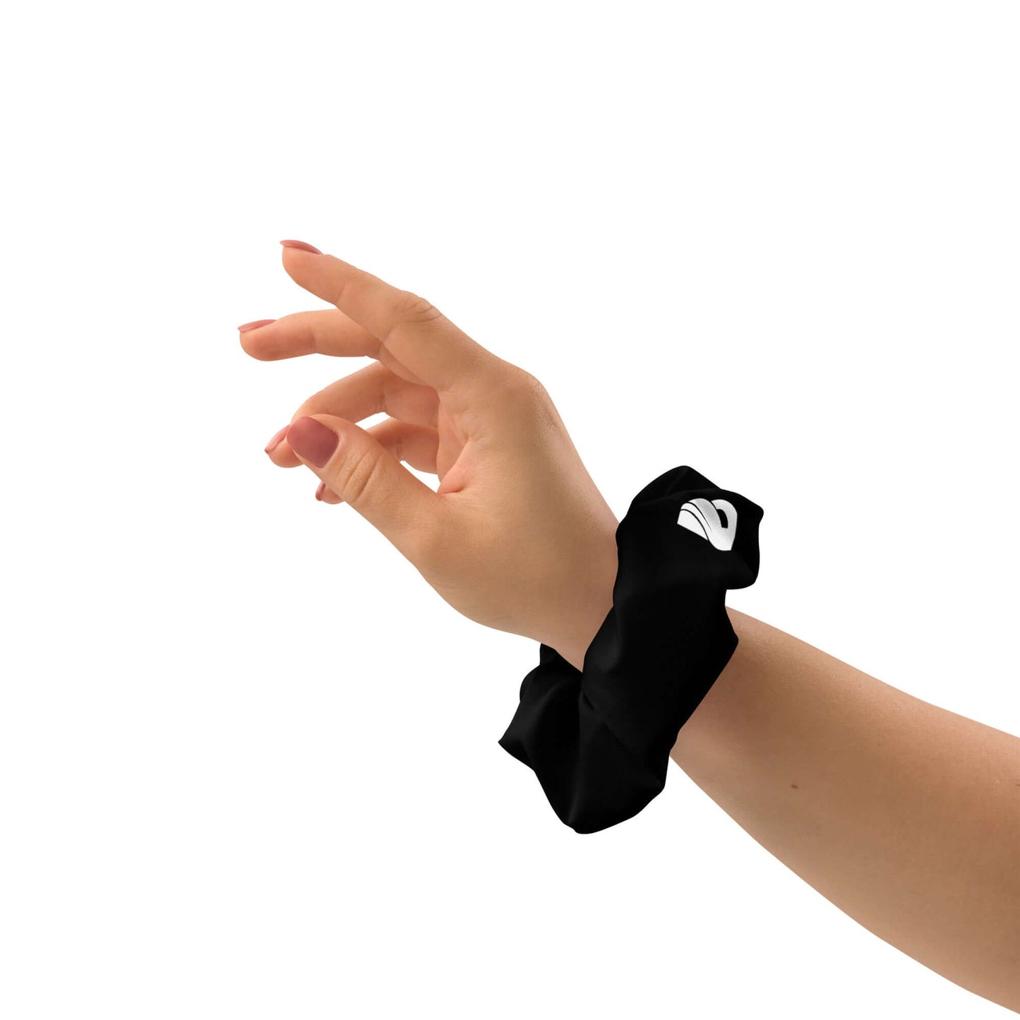 Hand wearing black Scrunchie N°2 with white logo, showcasing stylish and stretchy polyester accessory for hair support and fashion.