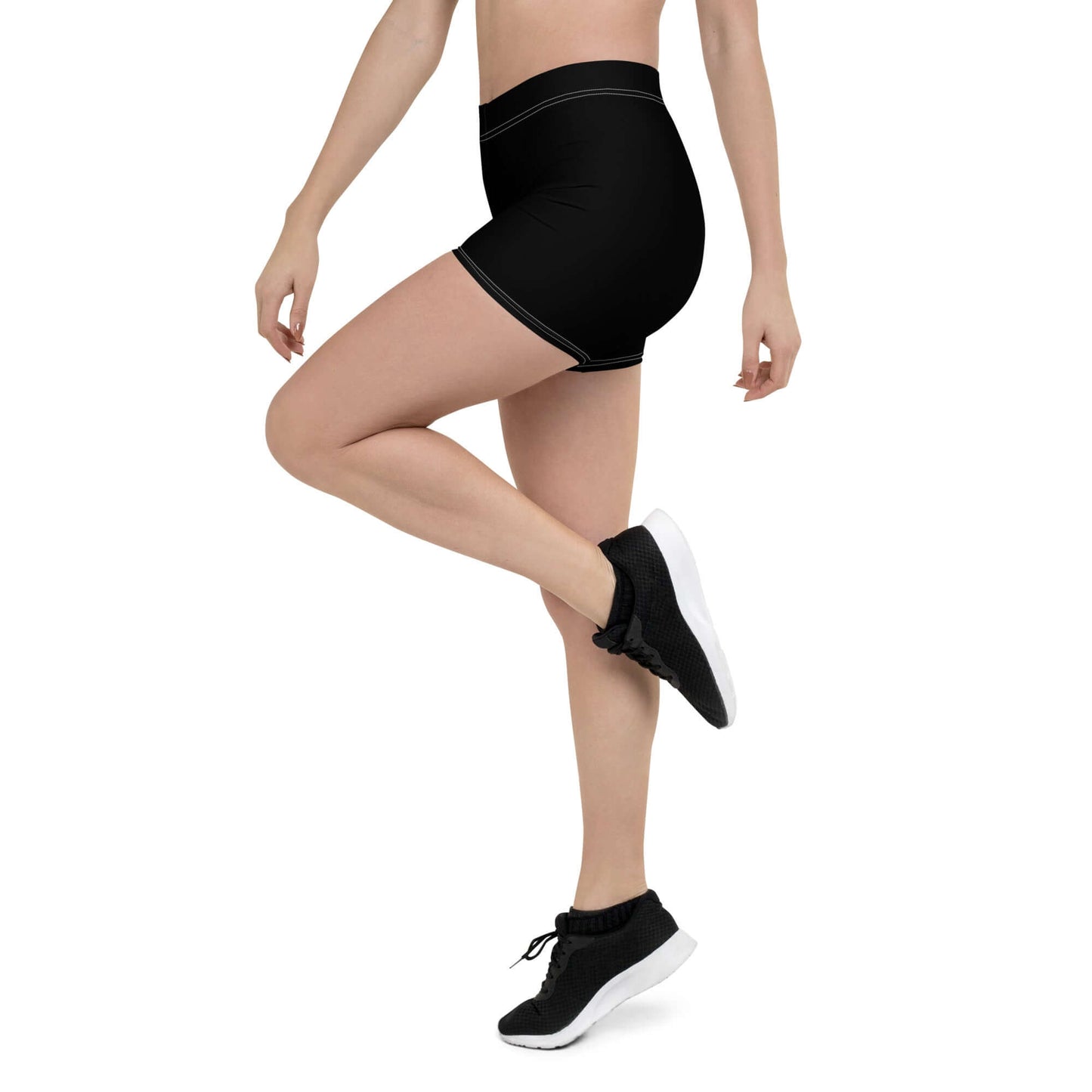 Person wearing black Shorts N°1 for active lifestyle, featuring four-way stretch and comfortable fit.