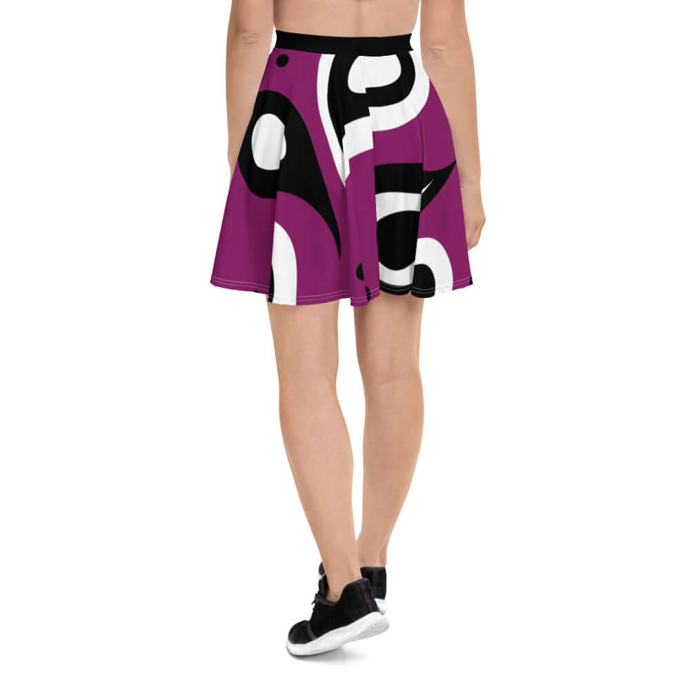 Skater-Rock N°3 featuring a bold purple and black abstract design, mid-thigh length with a comfortable elastic waistband.