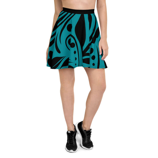 Woman wearing Skater-Rock N°8 with a blue and black abstract design, featuring a flattering silhouette and elastic waistband for comfort.
