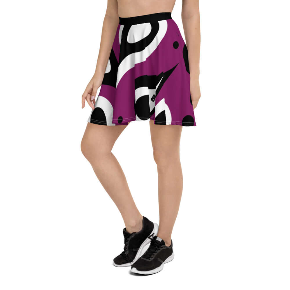 Woman wearing Skater-Rock N°3 with soft fabric and elastic waistband in purple, black, and white design.
