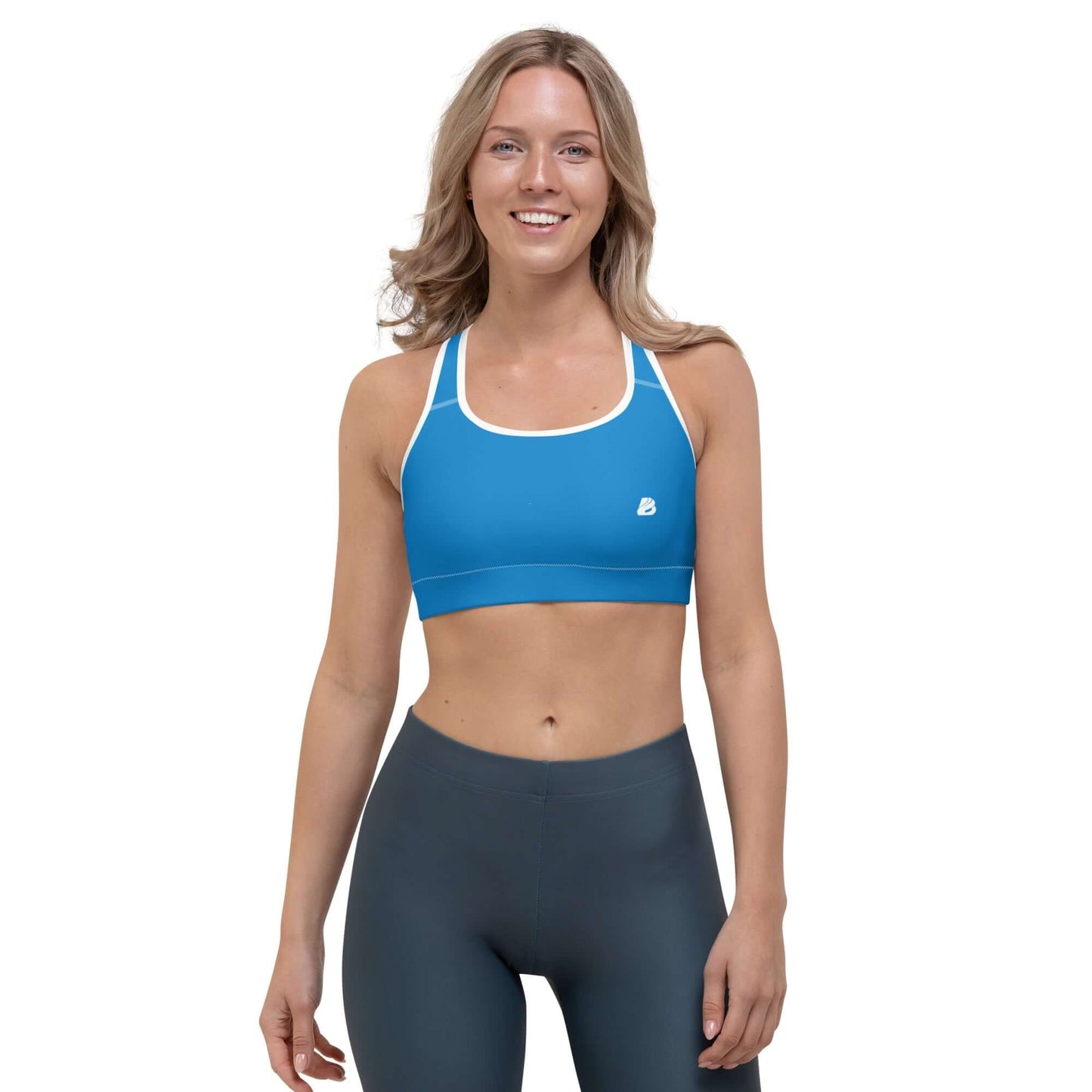 Woman wearing Sport-BH N°7 in blue, ideal for light to medium workouts, featuring moisture-absorbing material and supportive straps.