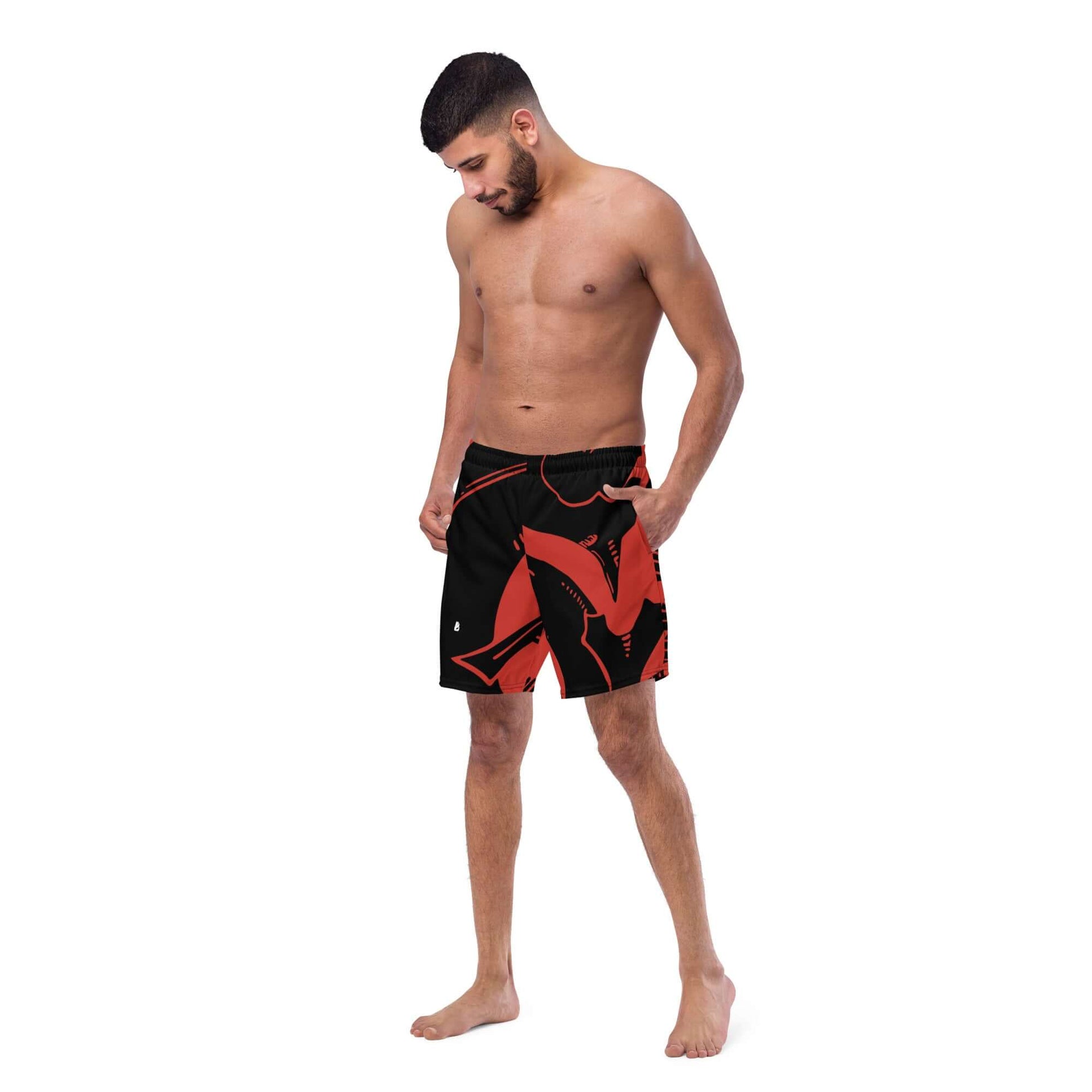 Herren-Badehosen N°4 in red and black design, quick-drying, breathable with pockets and silky lining, worn by man.