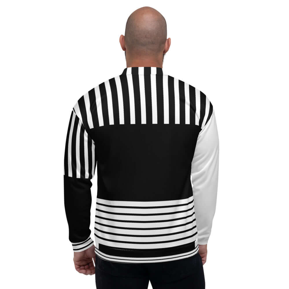 Back view of Unisex Bomberjacke N°3 with black and white striped pattern, showcasing stylish design and relaxed fit.