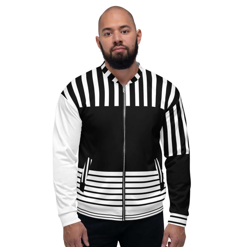 Unisex Bomberjacke N°3 in black and white striped design, modeled by a man in a casual pose.