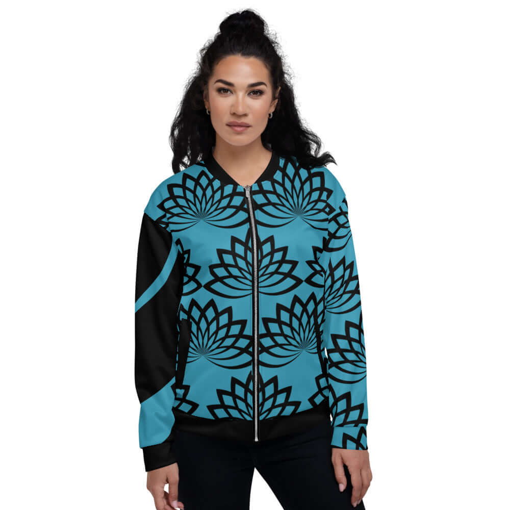 Model wearing Unisex Bomberjacke N°11 with blue and black lotus pattern, showcasing stylish design and unisex fit.