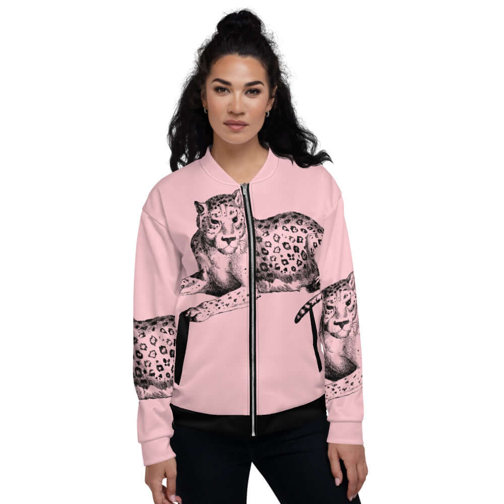 Model wearing Unisex Bomberjacke N°13 with leopard print on pink fabric, showcasing its stylish and versatile design.