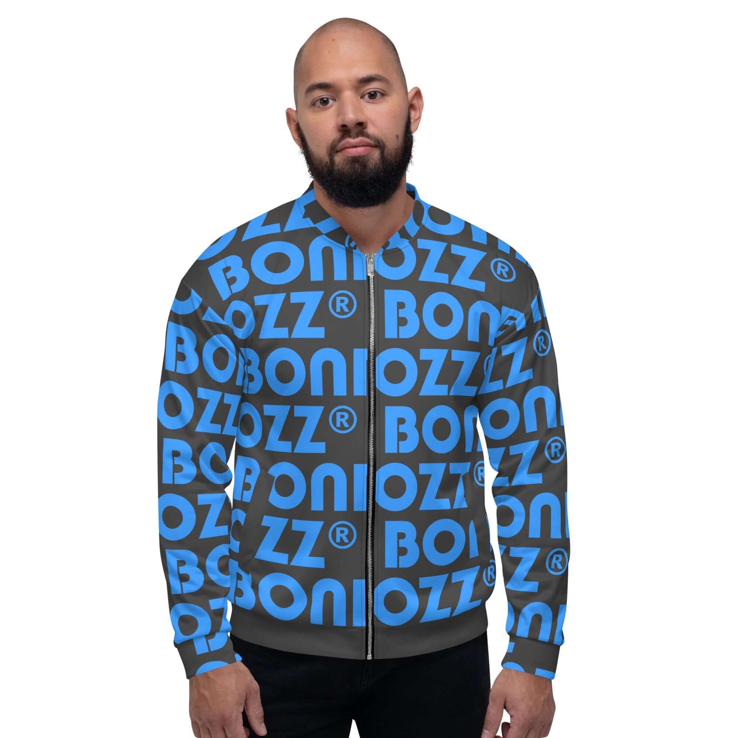 Man wearing Unisex Bomberjacke N°43 with a blue and black print design, showcasing its stylish look and relaxed fit.