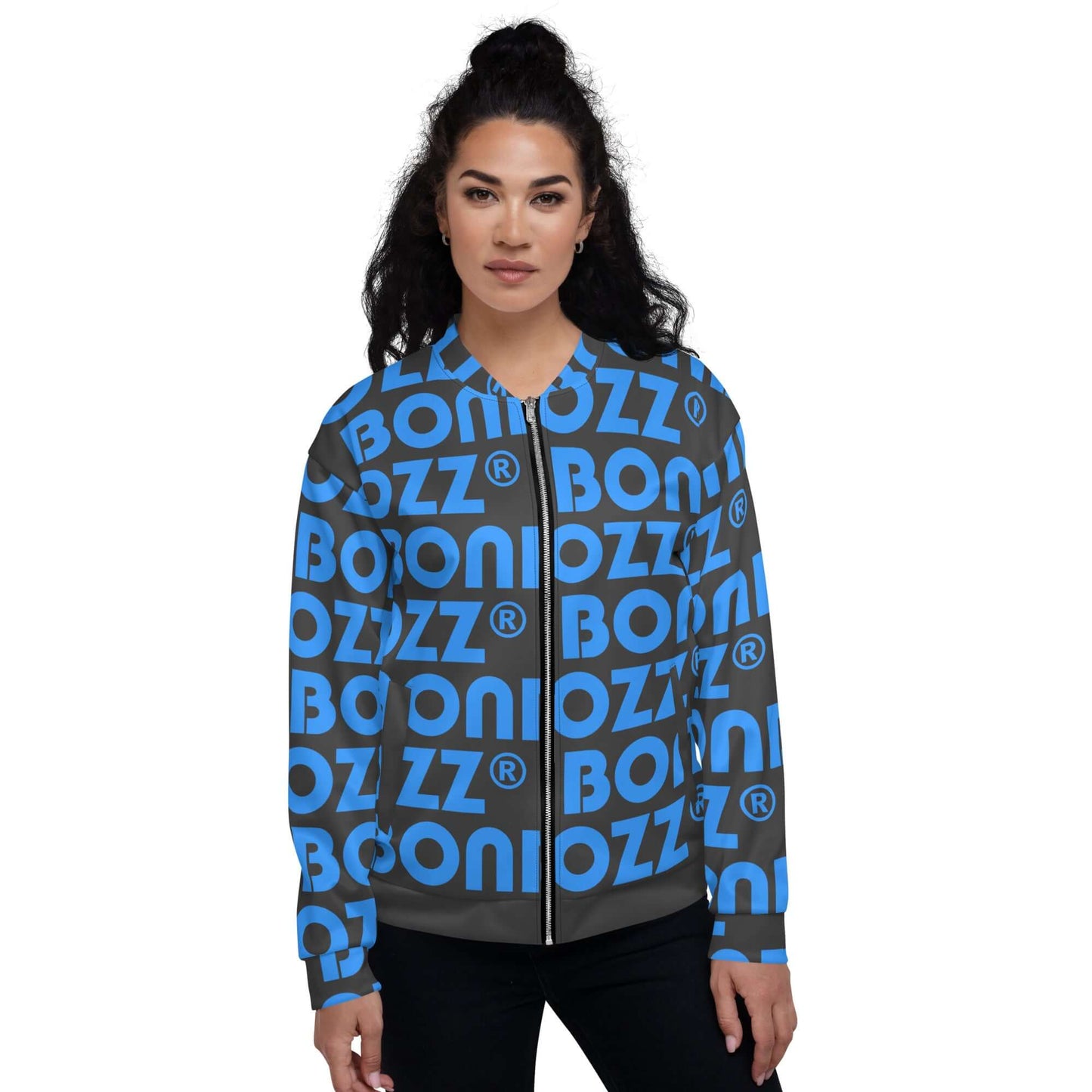 Woman wearing Unisex Bomberjacke N°43 with blue and gray graphic design, standing against a white background.