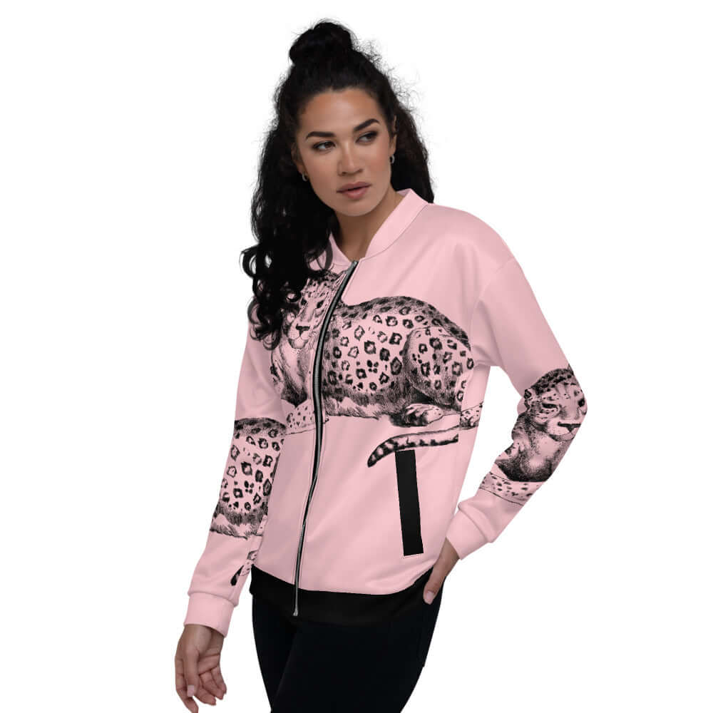 Unisex Bomberjacke N°13 in pink with leopard design, modeled by a woman, showcasing stylish casual wear
