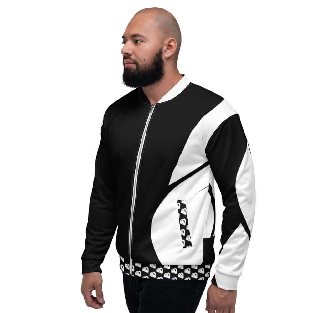 Man wearing Unisex Bomberjacke N°30 with black and white geometric design.