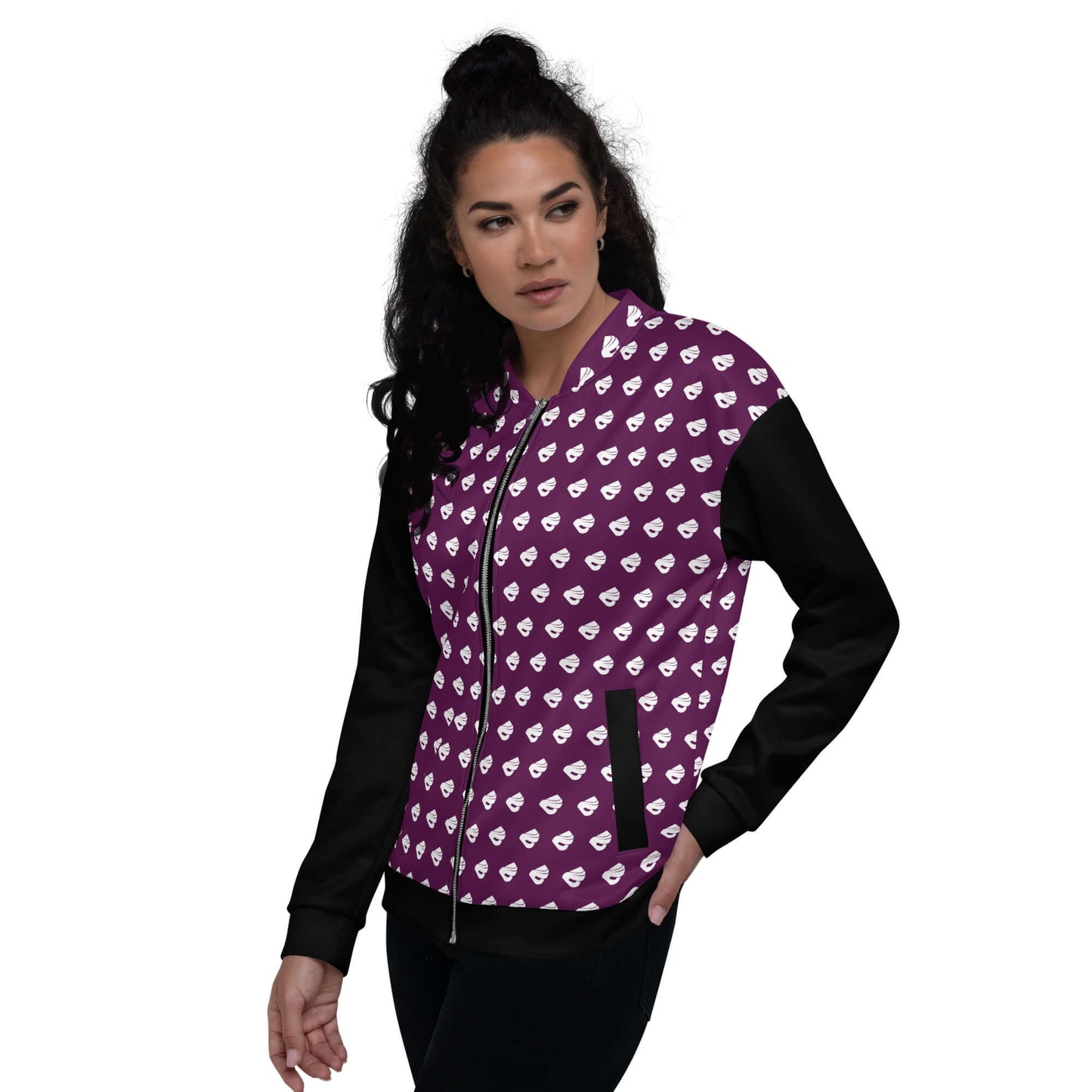 Person wearing Unisex Bomberjacke N°39 with heart pattern and black sleeves.