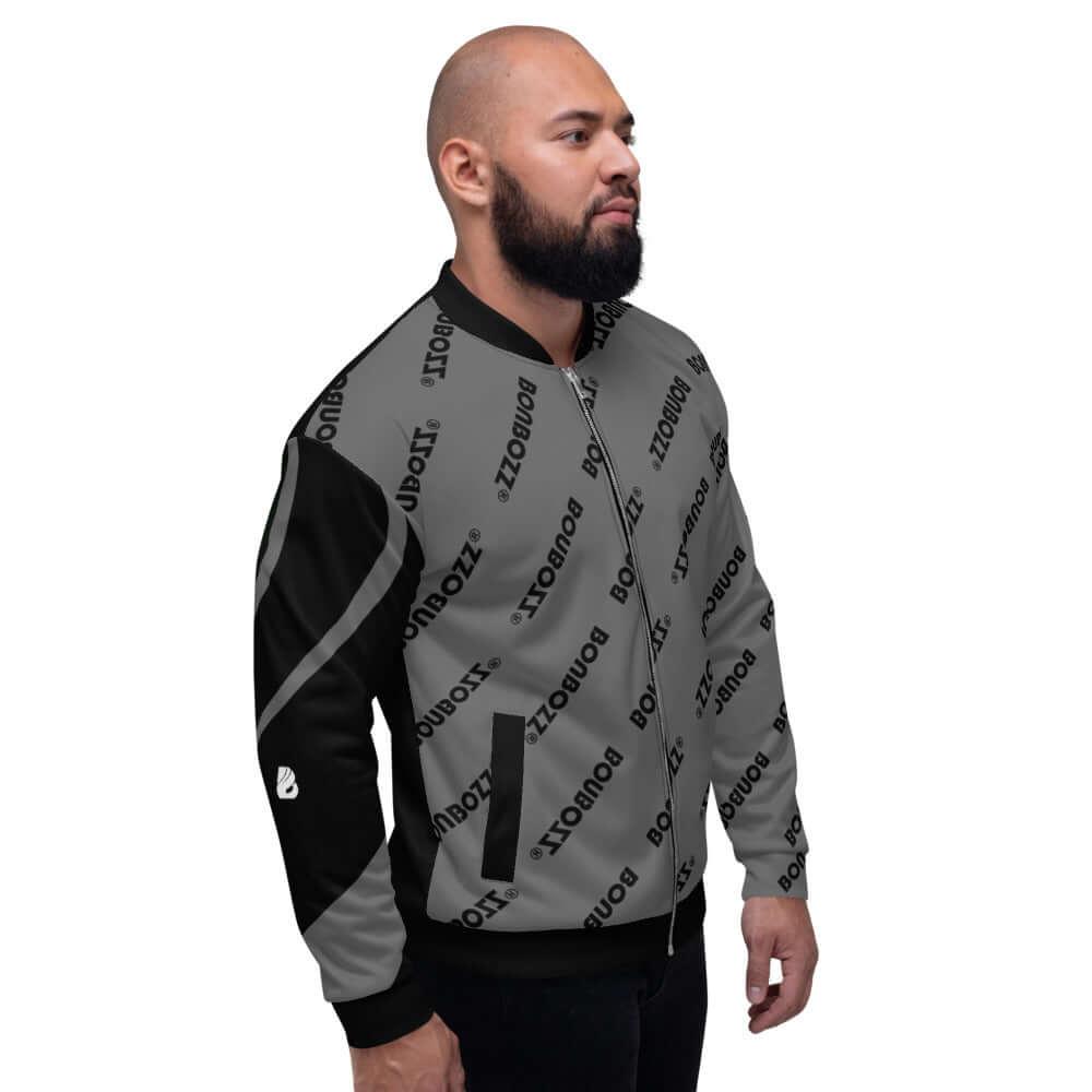 Unisex Bomberjacke N°9 modeled by a person, showcasing black and grey design with fleece interior, perfect for versatile styling.