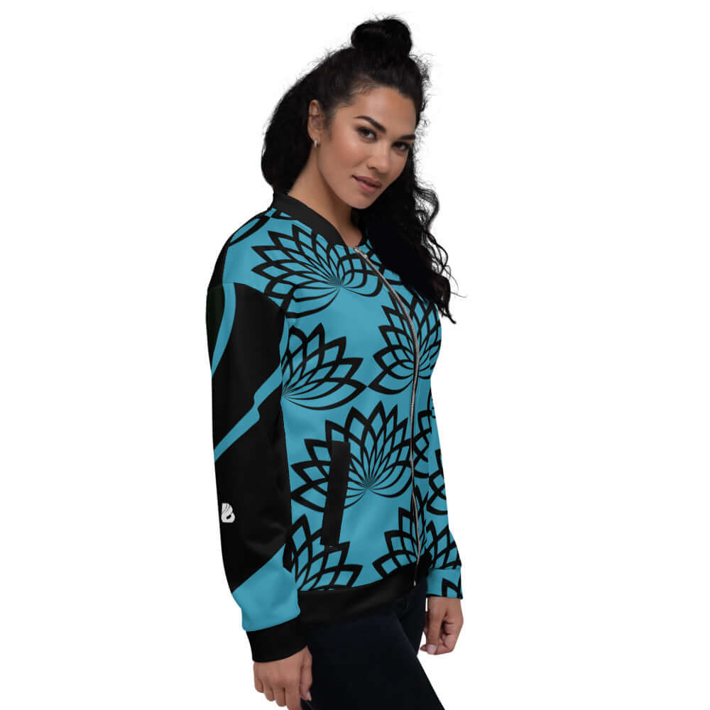 Unisex Bomberjacke N°11 in vibrant blue with floral pattern, modeled by a person, showcasing versatility and style for any outfit.