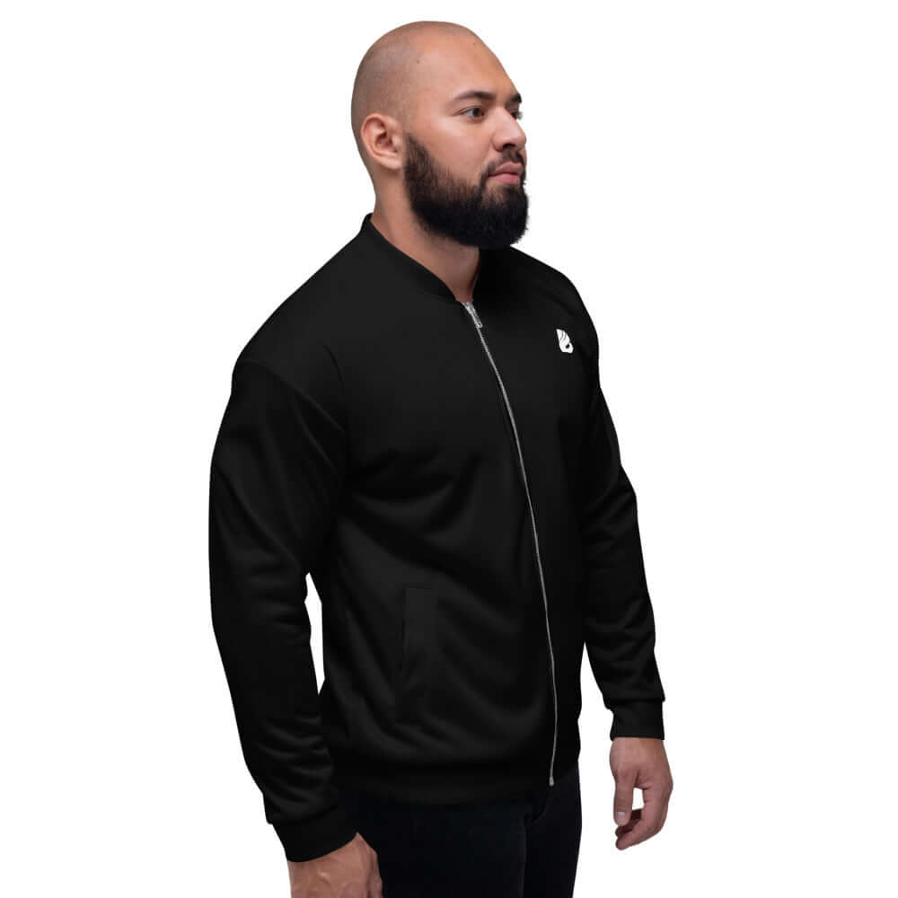Man wearing Unisex Bomberjacke N°15 with black design and relaxed fit, perfect for any outfit.