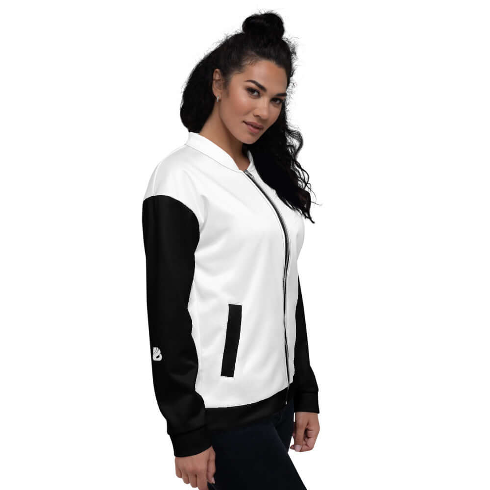 Unisex Bomberjacke N°16 in black and white, featuring a stylish A-line design and unisex fit, paired with casual dark pants.