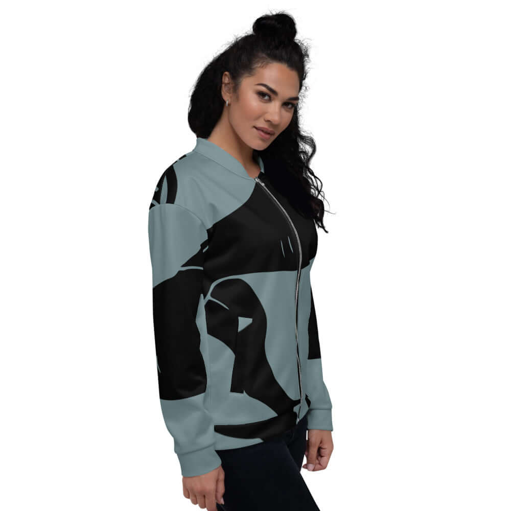Model wearing stylish Unisex Bomberjacke N°23, featuring a black and gray abstract design, showcasing versatile unisex style and comfort.