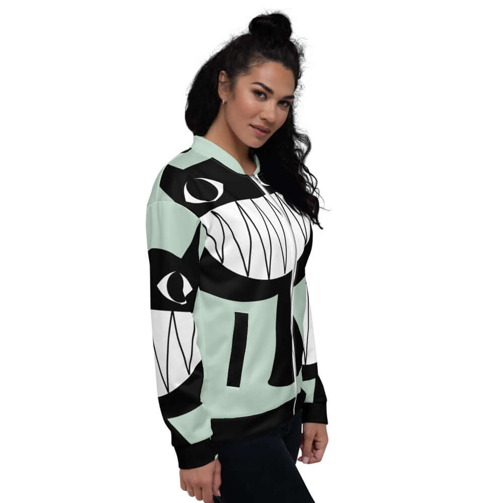 Model wearing Unisex Bomberjacke N°24 with bold black and white design and teal accents, showcasing the stylish and versatile jacket.
