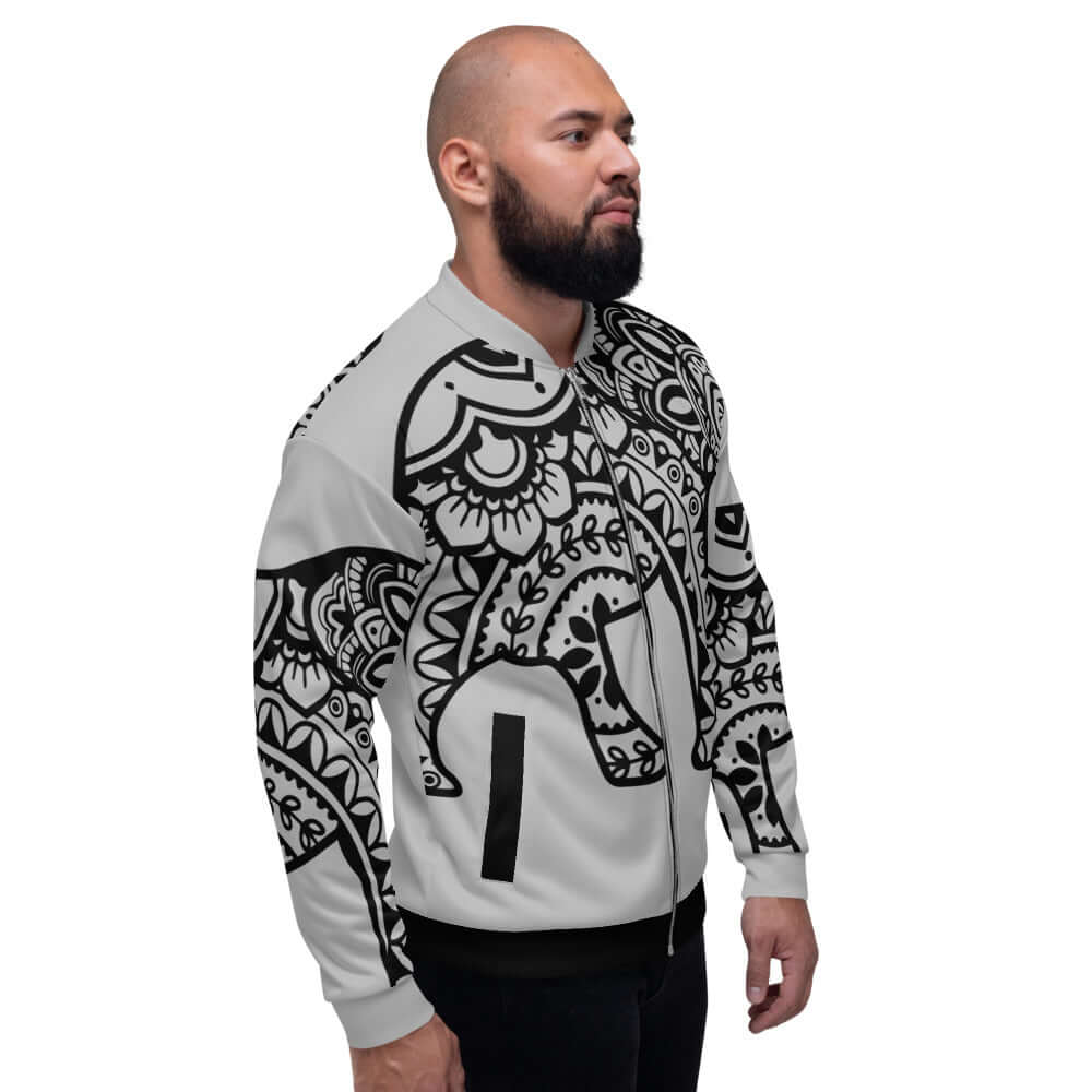 Man wearing Unisex Bomberjacke N°25 with black and white artistic pattern, showcasing stylish and versatile wardrobe essential.