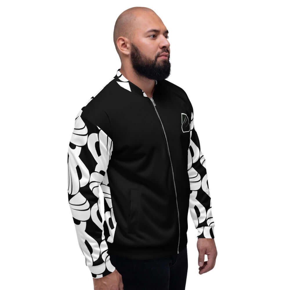 Unisex Bomberjacke N°32 in black and white worn by man, featuring all-over pattern, fleece inside, and relaxed fit for versatile styling.