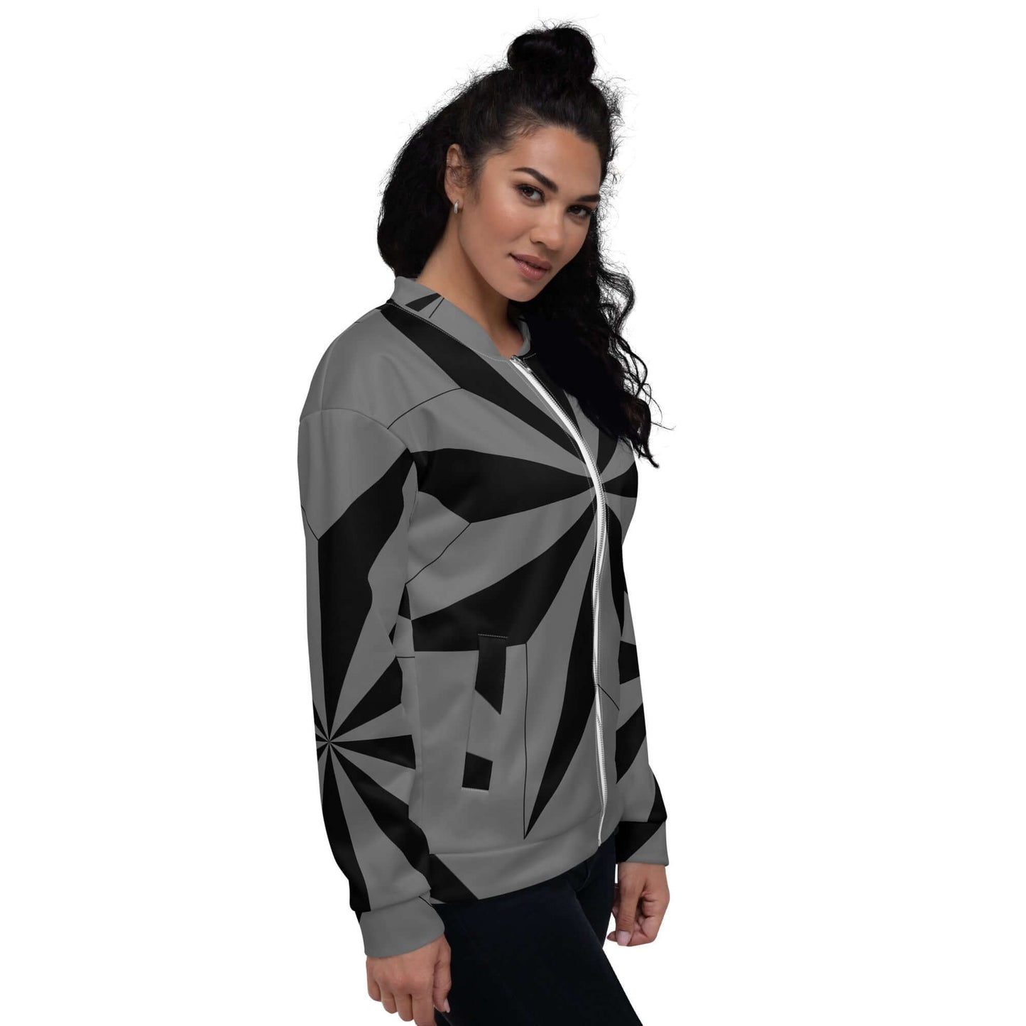 Woman wearing Unisex Bomberjacke N°41 with a geometric black and gray pattern, casual style outfit.