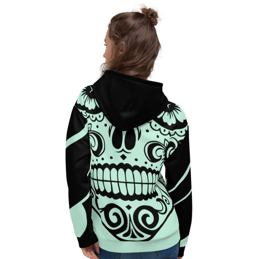 Woman wearing Unisex-Kapuzenpullover N°23 with vibrant print, showing back view of the soft and cozy hoodie.