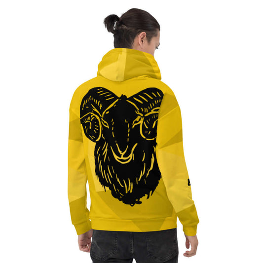 Back view of Unisex-Kapuzenpullover N°25 in yellow with a black ram print, showing its soft, vibrant design perfect for cool evenings.