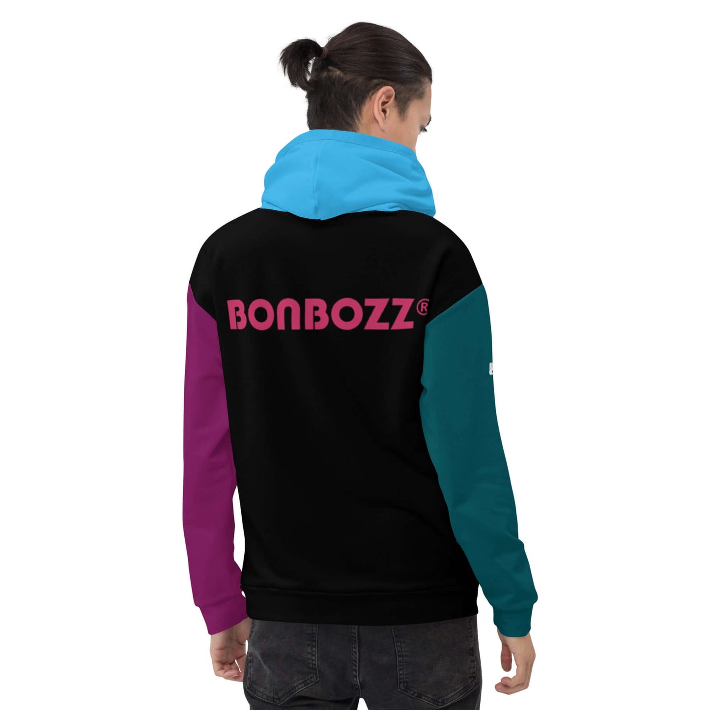 Person wearing a colorful Unisex-Kapuzenpullover N°43 with vibrant design, showing back view with hood and Bonbozz logo.