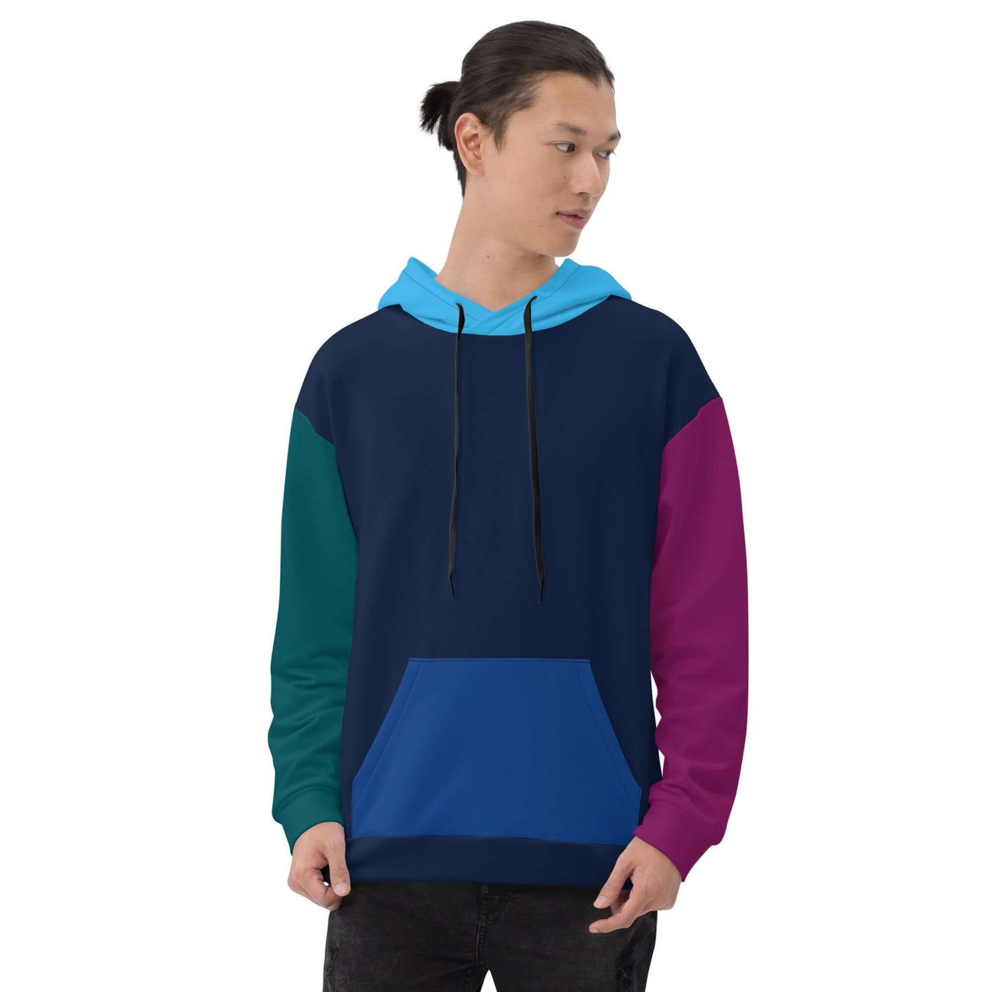Model wearing Unisex-Kapuzenpullover N°43 with vibrant color block design and two-tone hood.