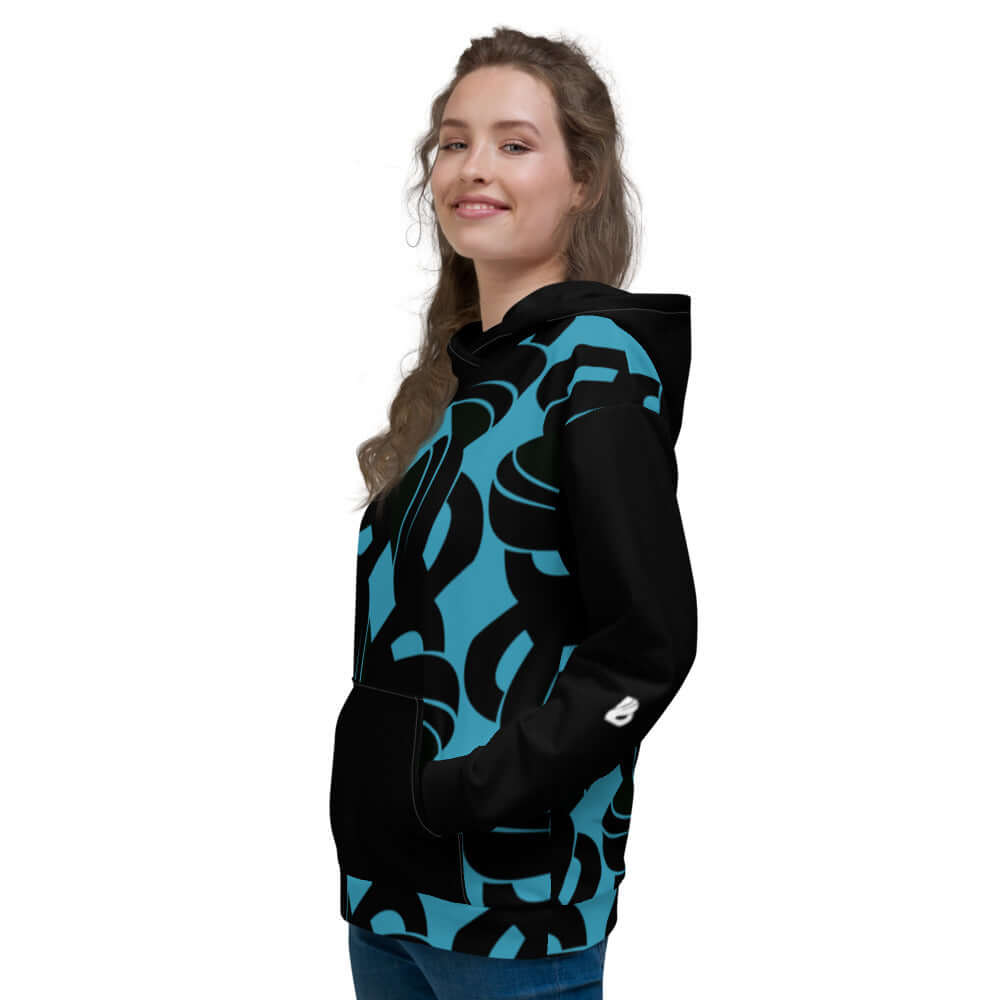 Person wearing Unisex-Kapuzenpullover N°32 with vibrant print in profile view