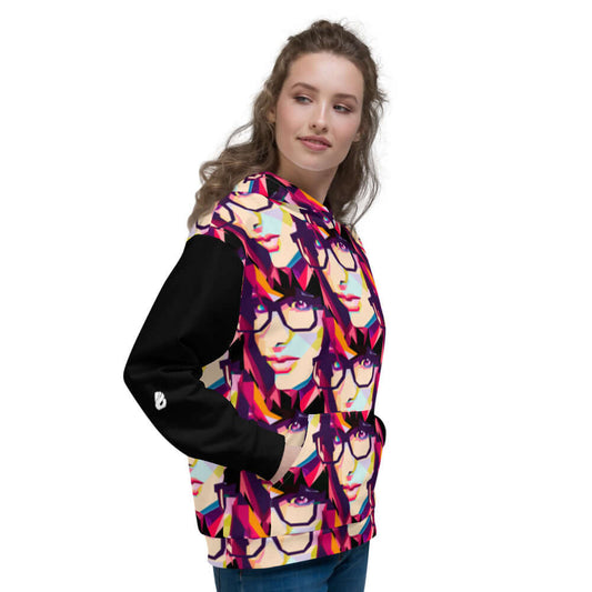 Model wearing Unisex-Kapuzenpullover N°29 with vibrant print, showing soft fleece in a cozy, relaxed fit.