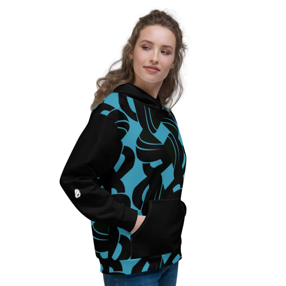 Woman wearing Unisex-Kapuzenpullover N°32 with vibrant print and soft fabric.