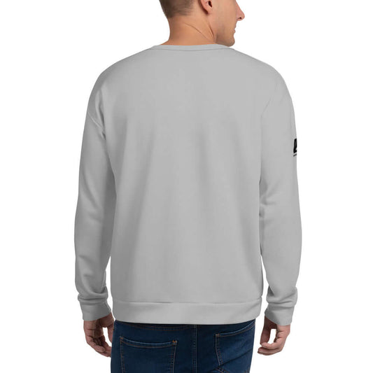 Back view of man wearing Unisex-Pullover N°2, showcasing craftsmanship and durable material with a soft feel for lasting wear.