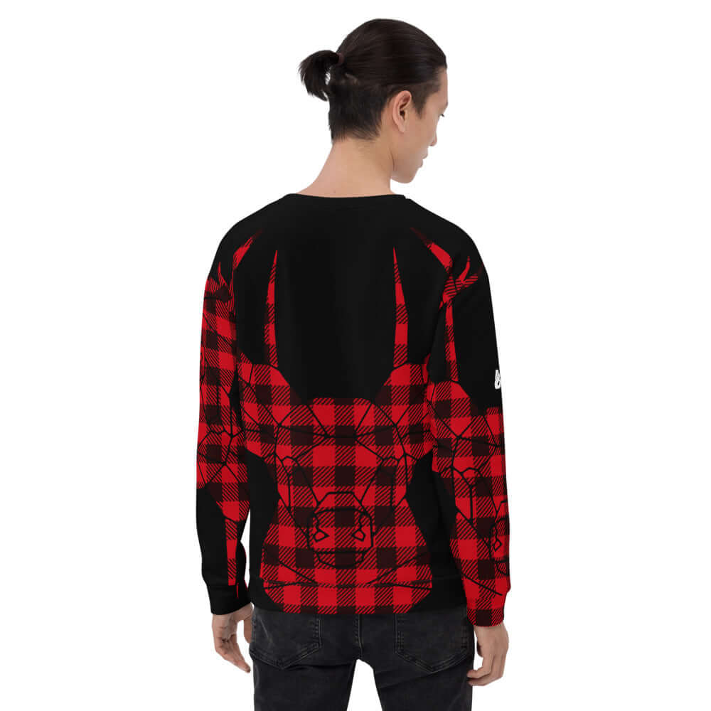 Unisex-Pullover N°7 in red and black plaid design, worn by a person, showcasing the back view with a bull pattern.