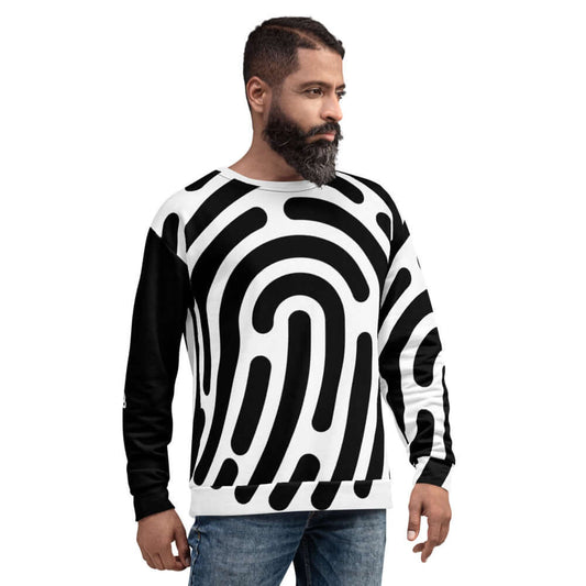 Man wearing stylish Unisex-Pullover N°1 with unique black and white pattern, crafted for comfort and durability, side view.