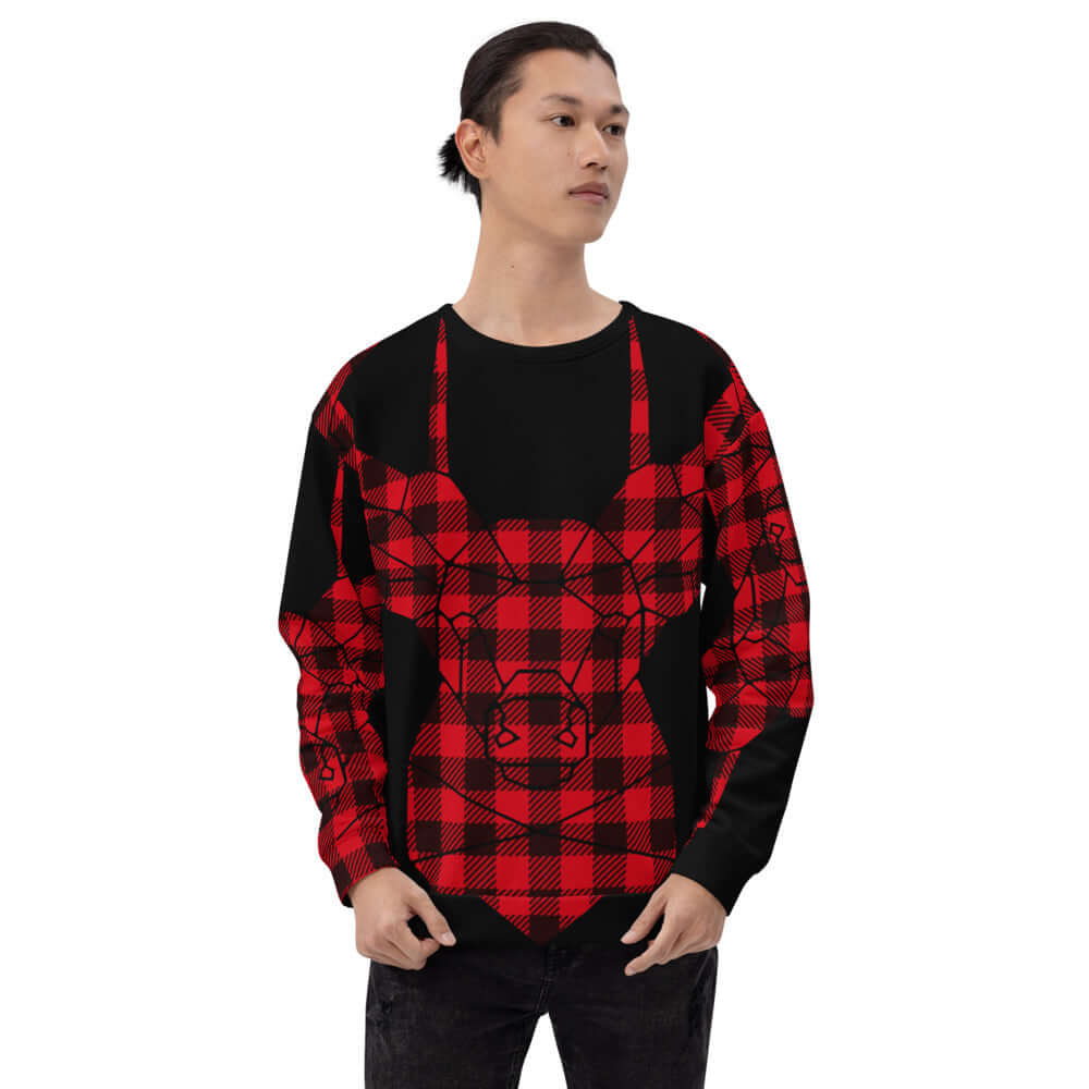 Model wearing Unisex-Pullover N°7, red and black checkered design, featuring durable material with soft brushed fleece.