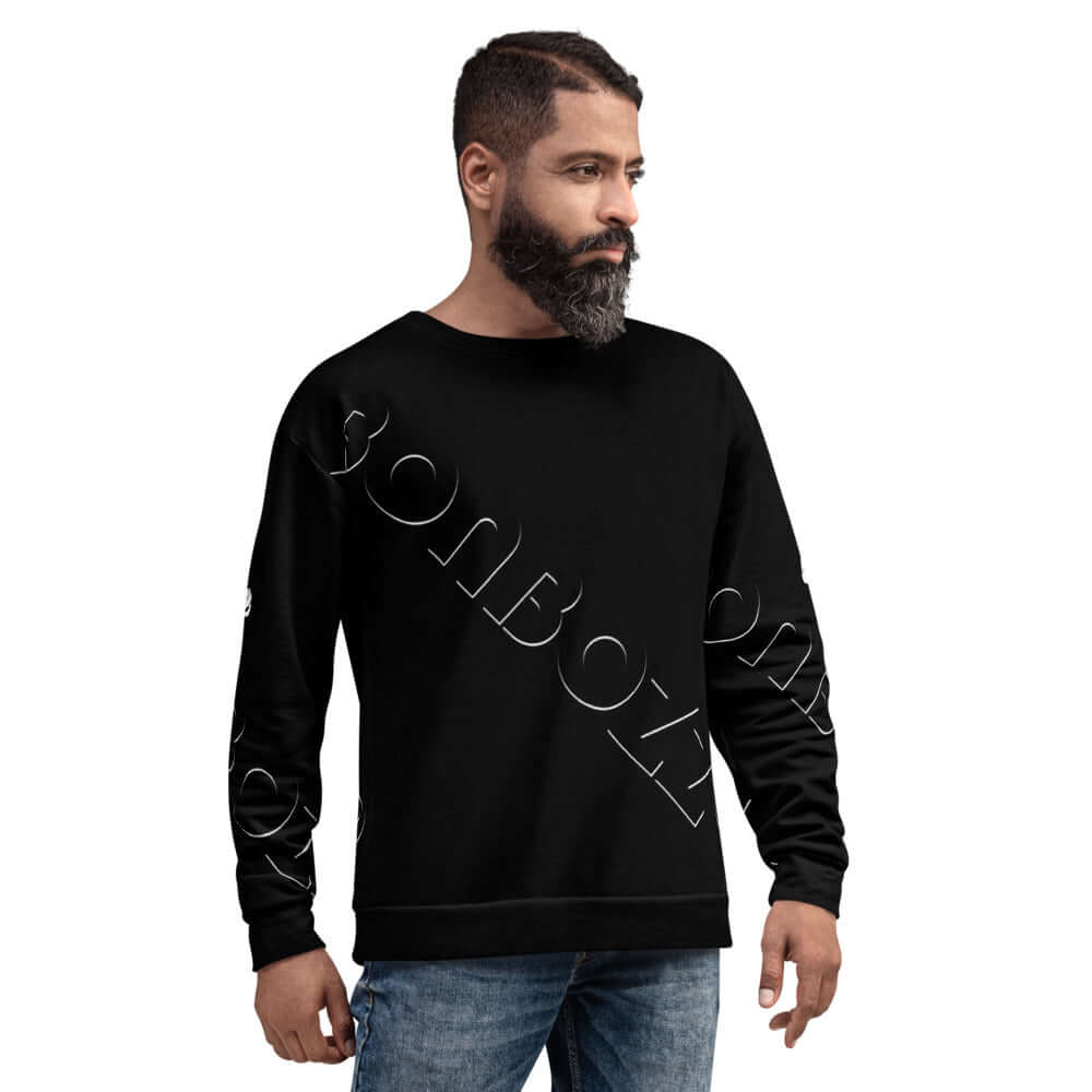 Unisex-Pullover N°14 in black worn by a model with jeans, showcasing handcrafted design with cotton-feel and soft brushed fleece.