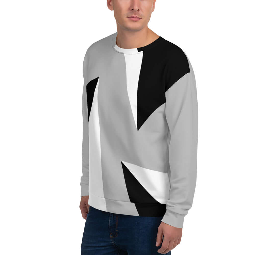 Unisex-Pullover N°2 with unique geometric design, cotton-feel fabric, black and white pattern, worn by model, front view.