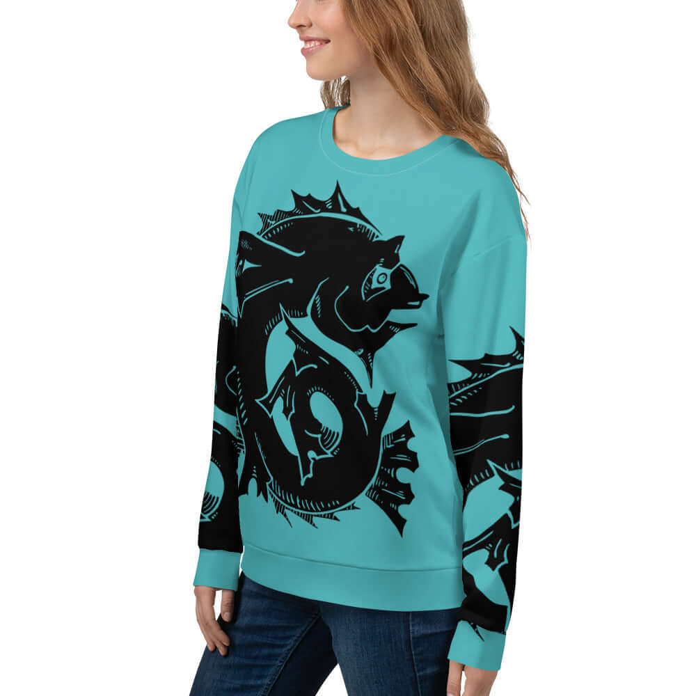 Person wearing Unisex-Pullover N°25, aqua blue with black artistic print, made from polyester, cotton, and elastane blend.
