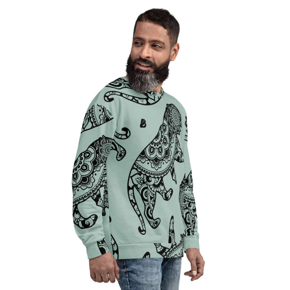 Man wearing Unisex-Pullover N°18 with intricate elephant design, featuring hand-sewn precision for style and comfort.