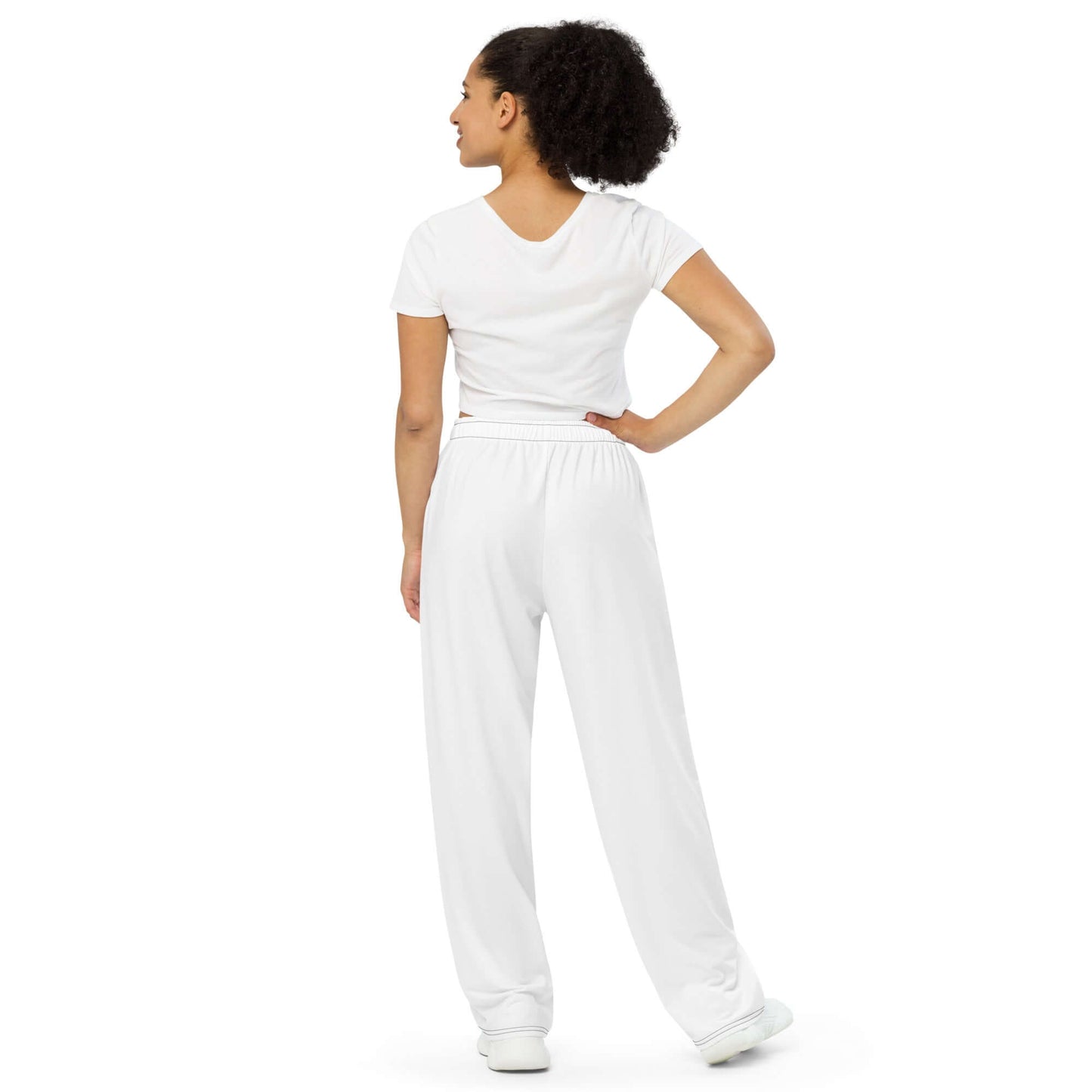 Unisex-Hose mit weiten Beinen N°0 in Weiß, lockere Passform mit elastischem Bund und Seitentaschen. Bequemer Pyjama-Stil für Alltag.