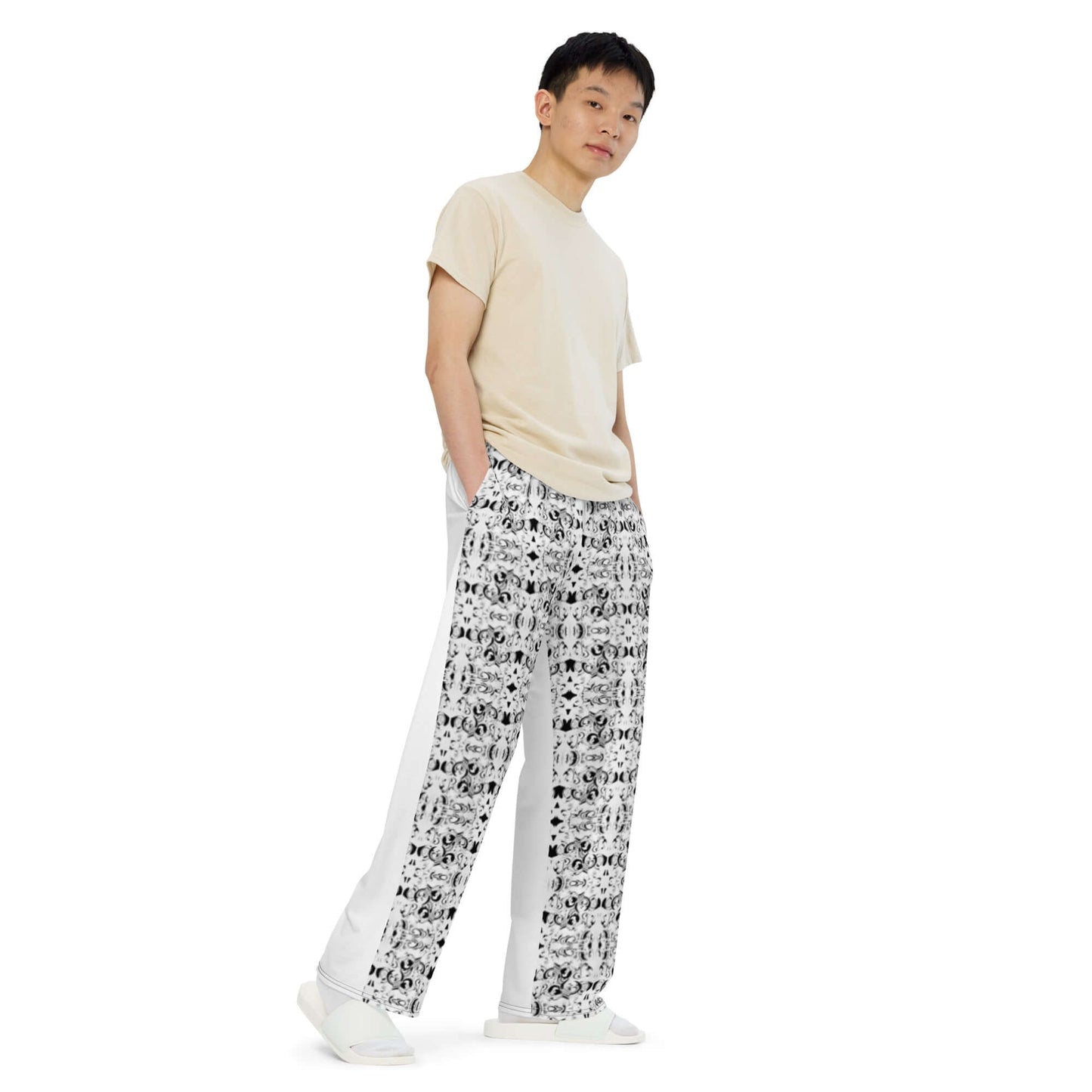 Person wearing Unisex-Hose mit weiten Beinen N°0, showcasing loose fit and elastic waistband with drawstring.