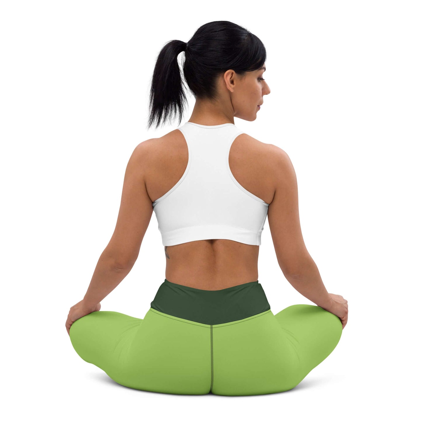 Woman meditating in green Yoga-Leggings N°43, showcasing super soft and stretchy fabric with high-waisted comfort.