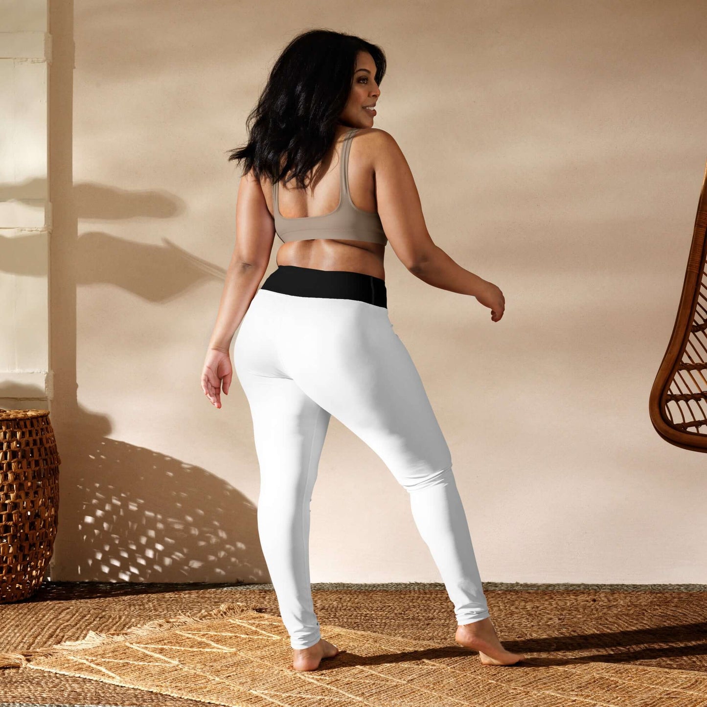 Woman wearing Yoga-Leggings N°44, showcasing the comfortable, stretchy fabric and high waistband in a bright, airy room.