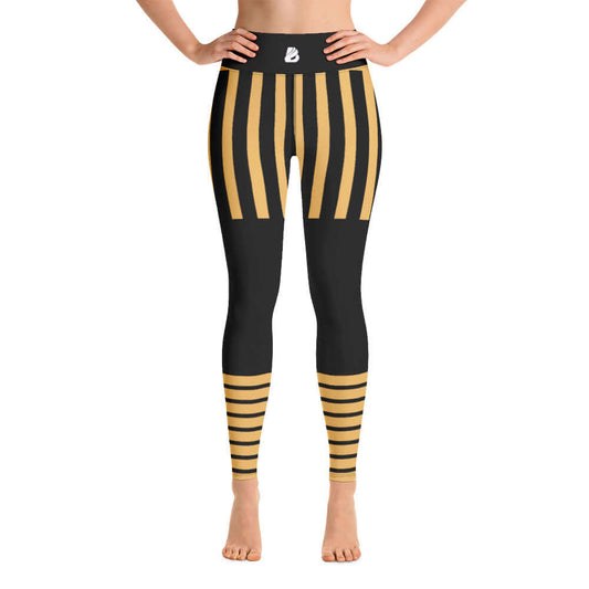 Yoga-Leggings N°5 with black and gold vertical stripes, high-waisted, made from soft, stretchy material for comfort and support.