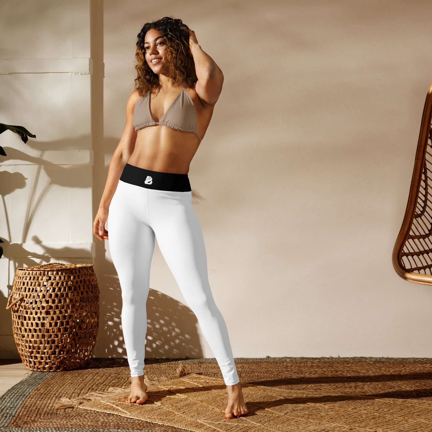 Woman wearing Yoga-Leggings N°44, showcasing four-way stretch fabric and high waist in a serene setting.