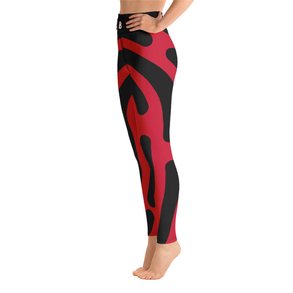 Side view of person wearing red and black Yoga-Leggings N°2, featuring soft, stretchy fabric with high waist and vibrant design.