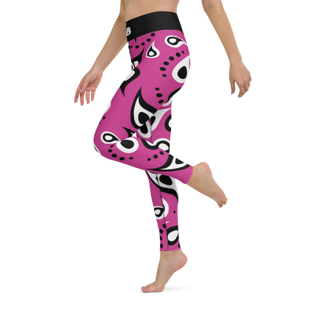 Woman wearing vibrant Yoga-Leggings N°18 with pink and black abstract pattern, four-way stretch, and high waistband for comfort.
